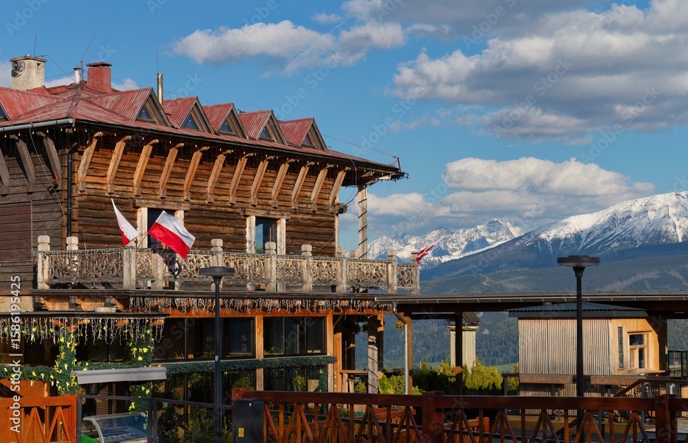 Fototapeta premium typical stylized mountain building and mountains in Zakopane - Lesser Poland - Poland