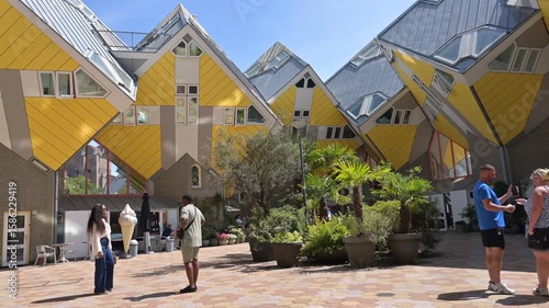Rotterdam Netherlands - July 12 2025: View of the cube houses. Tourists looking at the landmarks 