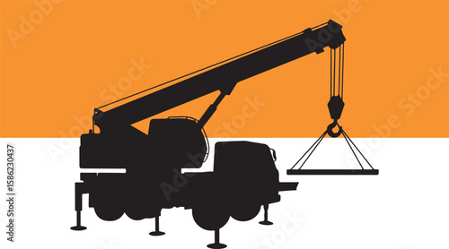 Silhouette of a mobile crane lifting a rectangular object in a construction zone