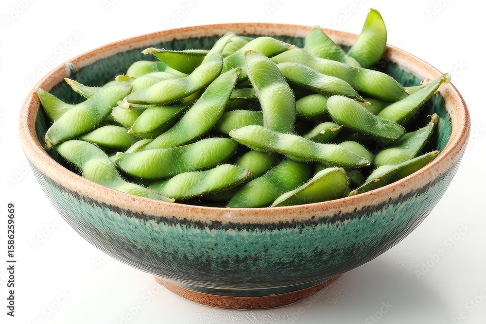 A bowl of edamame pods on a white background. Plant-based protein, healthy snacks, Asian cuisine A bowl of edamame pods on a white background. Plant-based protein, healthy snacks, Asian cuisine