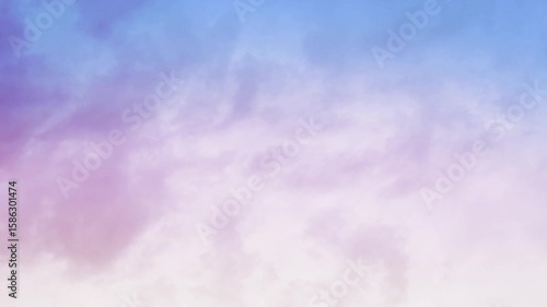 Clouds Moving Across a Sunset Sky 4K Loop features clouds moving across the sky with sunset colors of yellow, red, and blue in a loop.