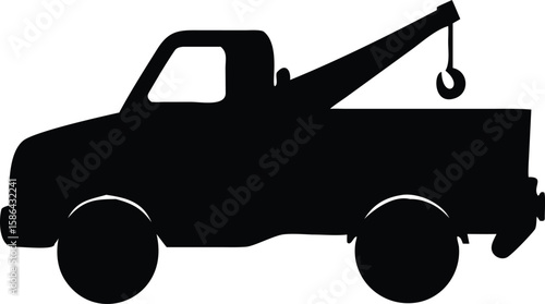 Silhouette of a tow truck with its crane arm extended, ready for vehicle recovery and assistance.