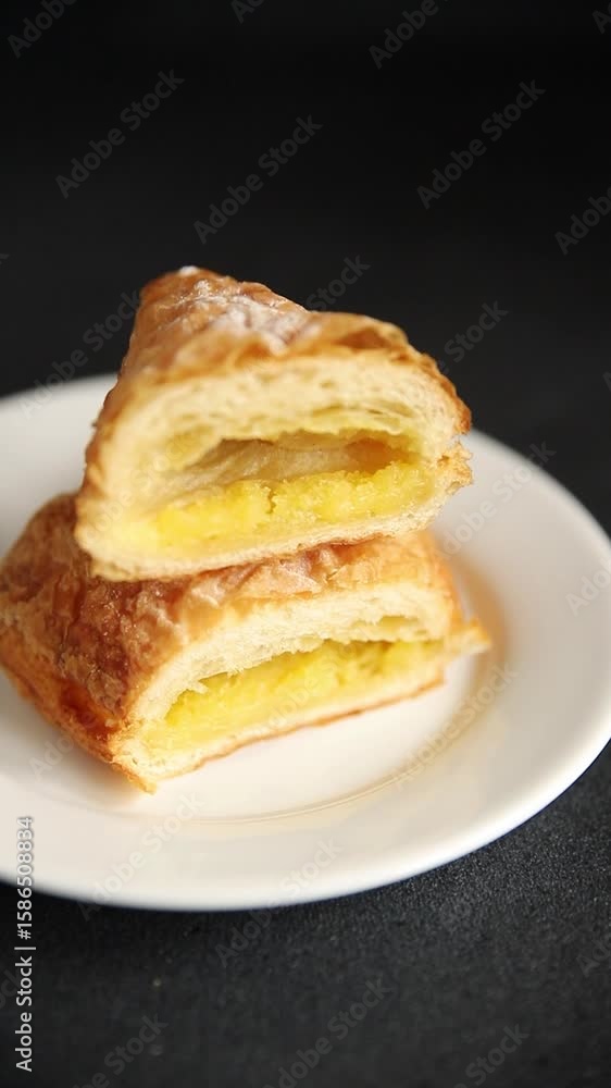 Triangle cake almond puff pastry sweet dessert almond cream filling fresh delicious gourmet food background on the table rustic food top view copy space Triangle cake almond puff pastry sweet dessert almond cream filling fresh delicious gourmet food background on the table rustic food top view copy space