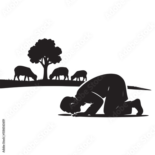 Muslim man praying on his knees in a field with sheep and a tree