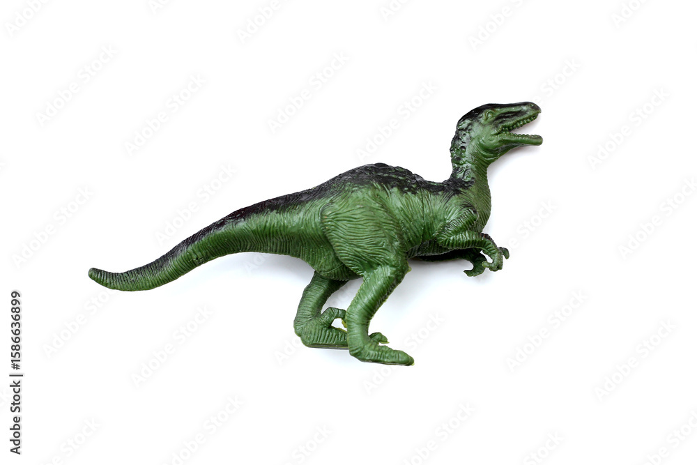 Fototapeta premium Plastic dinosaur toy on white background