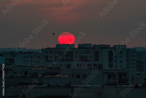 Wallpaper Mural Sunset Over City Apartment Blocks with Red Glowing Sun Torontodigital.ca
