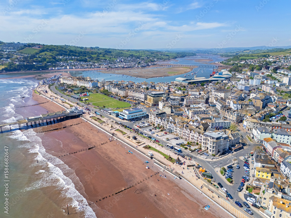 Obraz premium Aerial Image of the Teignmouth coast line basking in fine Spring sunshine, in Devon, United Kingdom. 10th May 2025.