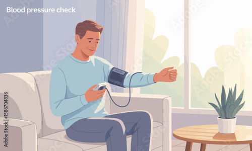 A man sitting on a sofa at home is checking his blood pressure with a digital monitor, in a brightly lit room.