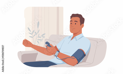 Man sitting on a couch, checking his blood pressure with an electronic monitor at home.