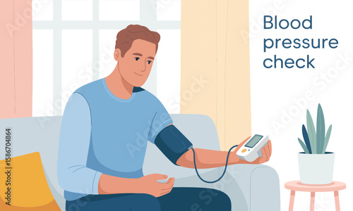 A man sitting on a couch, checking his blood pressure with a digital monitor at home.