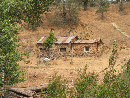 Abandoned stone house in mountains