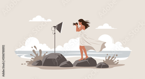 Photographer Capturing Coastal Beauty With Studio Light On A Windy Day