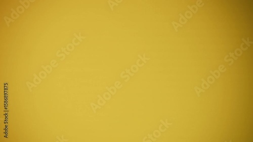 Abstract and Background Series : Yellow flashing LED lights. Backdrop of mustard flashing lights. Modern lighting in warm tones.