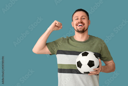 Happy man with soccer ball ...