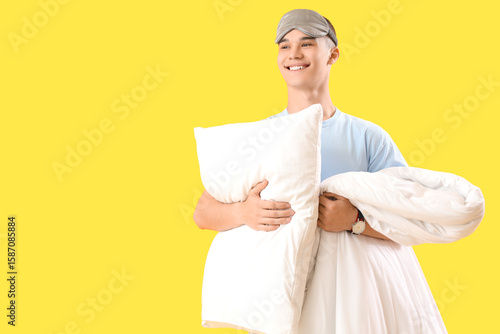 Young man with sleep mask, ...