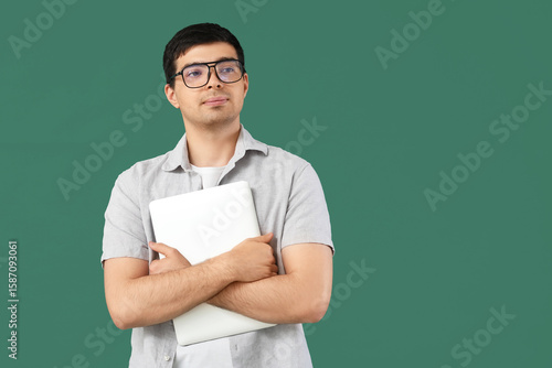 Male programmer with laptop...