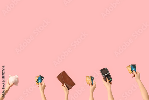 Multiple hands holding a pi...