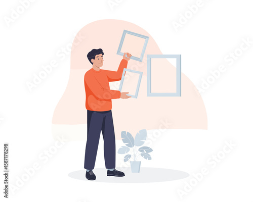 Young man carefully selecting picture frames for home decor flat vector illustration