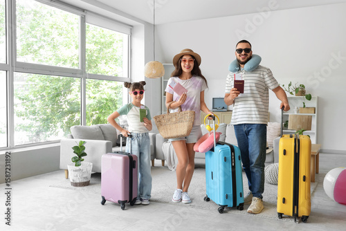 Family of tourists with pas...