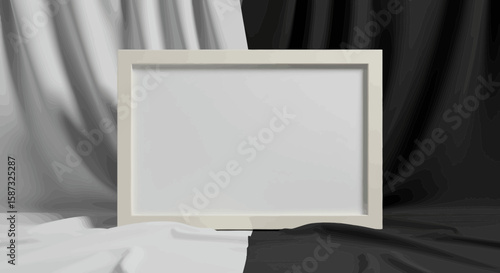 Minimalist mockup of a white rectangular frame against draped black and white fabric