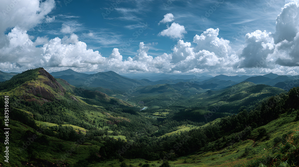 Fototapeta premium Scenic wide-angle view showcasing lovely skies, lush hills, and mountains