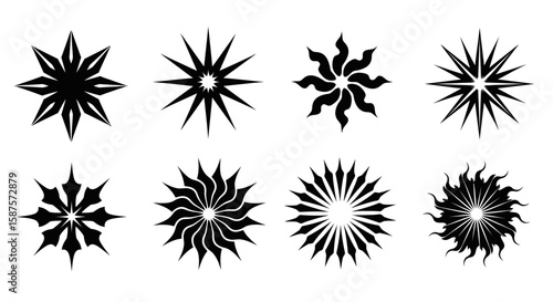 Set of Abstract Star Shapes: A group of black and white shapes create a series of star shape, evoke a modern, celestial theme.