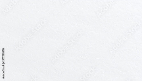 White paper texture with a seamless blank surface pattern, like a cold winter wall or canvas, offers a clean, rough, gray backdrop