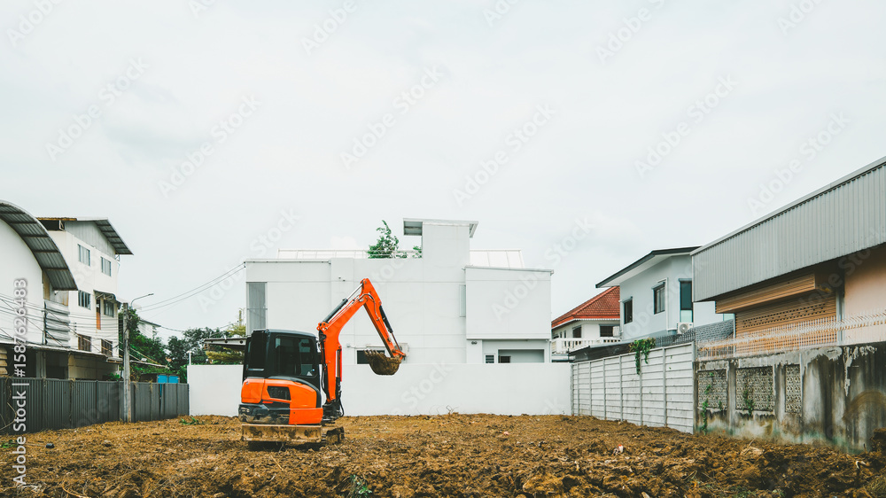 Obraz premium The land is being cleared by a tractor, paving the way for the construction of a house or shophouse, embodying a promising real estate investment concept.