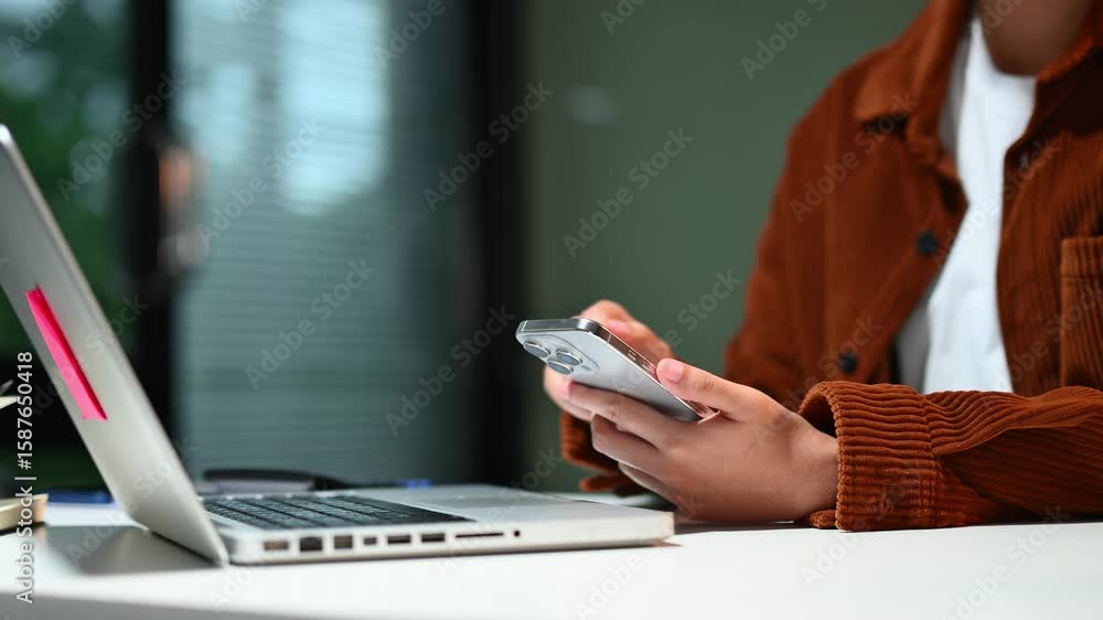 Businessman hand working digital marketing media in virtual screen with mobile phone and modern compute
