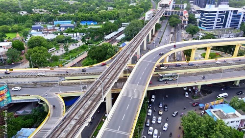 Aerial shot tiered flyovers crossing Bangalore cityscape