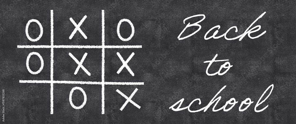 Obraz premium Back to school banner with tic-tac-toe game played on the blackboard
