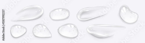 Clear gel smear set with various shapes - transparent cosmetic serum drops, glossy liquid patches, smooth texture samples for skincare product display, hyaluronic acid or medical ointment advertising.