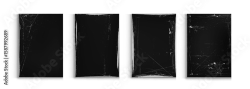 Distressed worn paper textures with black background - vintage scratched rectangles with aged surface damage. Grunge overlay effects for retro poster design. Antique document mockup or weathered bg.