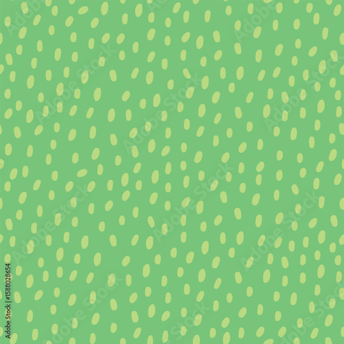 Abstract playful green pattern with hand-drawn yellow spots for eco branding and textile usage
