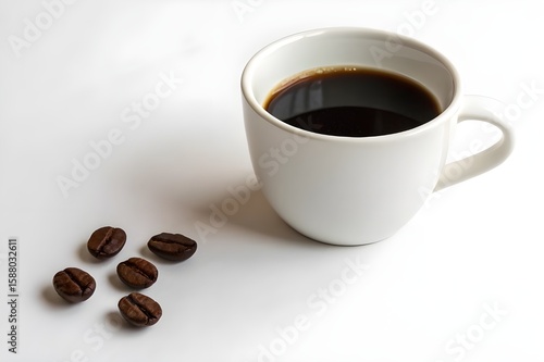 White Coffee Cup with Black Coffee and Coffee Beans on White Background