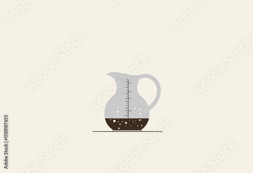 Glass pitcher with measurement markings filled with dark liquid  