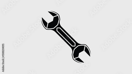 Black and white graphic displays a spanner, a crucial mechanical tool for repairs, maintenance, and construction, ideal for diverse projects.