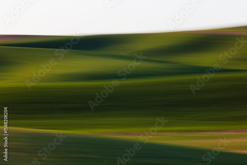 Blurred motion abstract of rolling hills and Spring wheat grass, Palouse