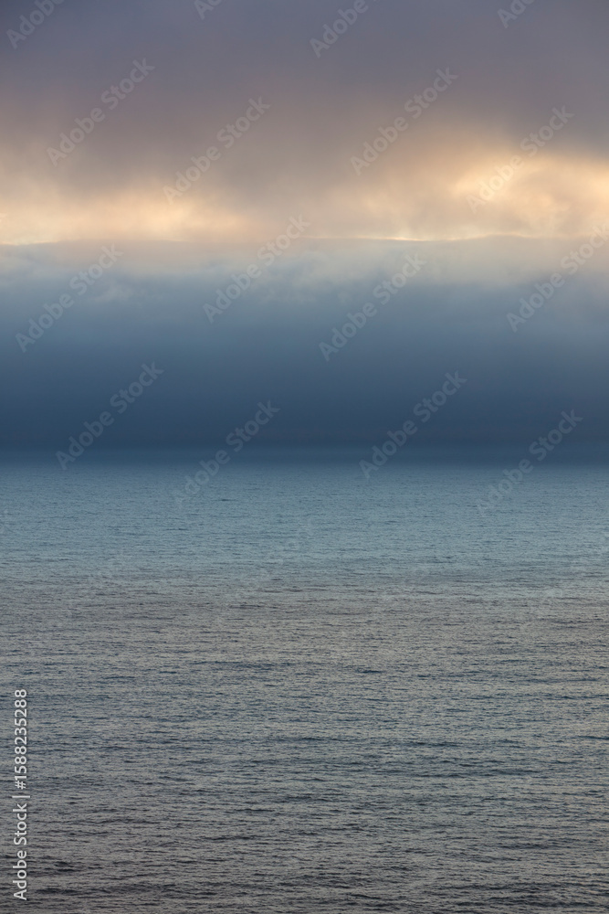 Lifting clouds and fog over the Pacific Ocean, dusk, Oswald West State Park, Oregon Lifting clouds and fog over the Pacific Ocean, dusk, Oswald West State Park, Oregon