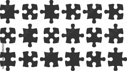 A collection of black puzzle pieces arranged on a white background surface