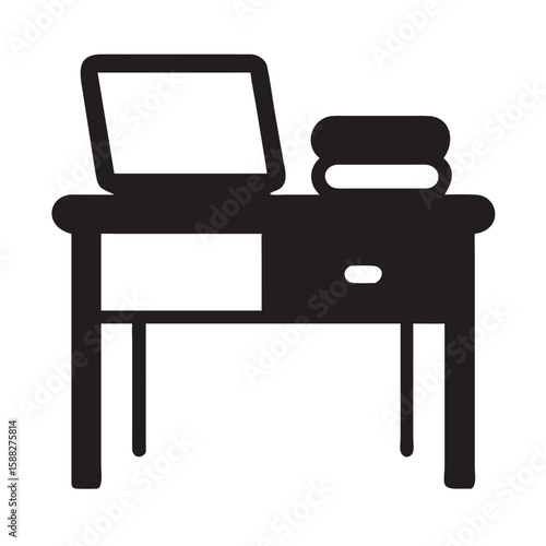 Desk with open laptop and textbooks