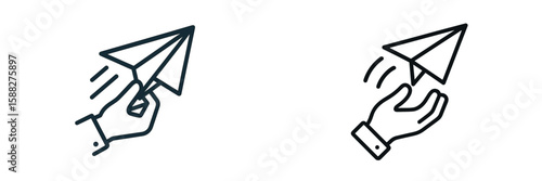 People launching paper airplanes during a fun outdoor activity in a sunny park on a clear day