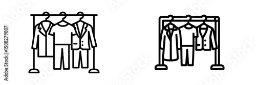 Clothing rack displaying a variety of garments including suits, shirts, and dresses in a retail setting during daytime