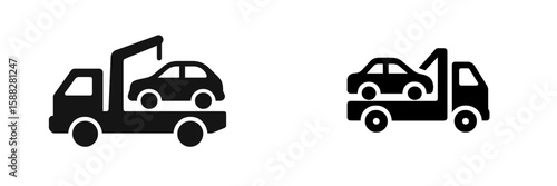 Tow trucks transporting vehicles at a roadside assistance scene during the day