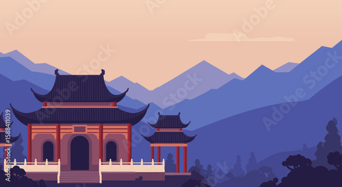 Traditional Asian temple against a mountain backdrop at dusk