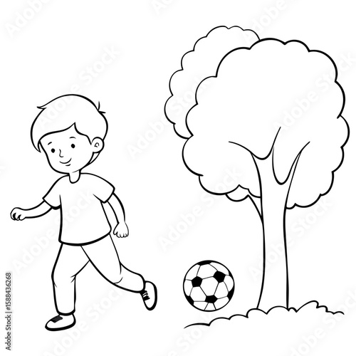 Young boy running towards soccer ball near tree in park  