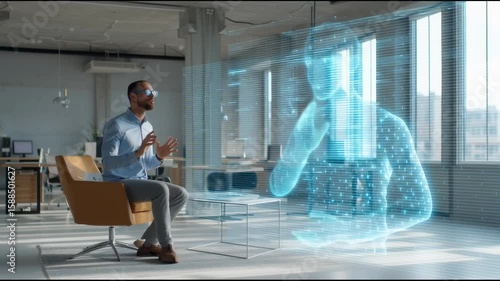 Office worker talking to an AI assistant hologram in modern workspace real person interacting with virtual intelligence