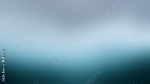 Photo of a soft gradient background transitions from light gray to deep teal