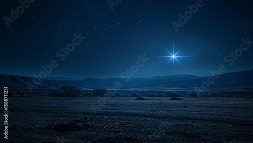 Star shining in clear night sky above remote desert valley. Christmas concept.  
