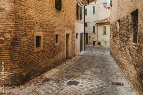 Fototapeta Naklejka Na Ścianę i Meble -  The traditional narrow medieval streets in Corinaldo, considered one of the most beautiful in Italy
